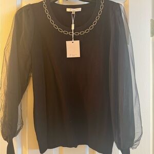 Sioni Black Top with Sheer Sleeves and Embellished Neckline